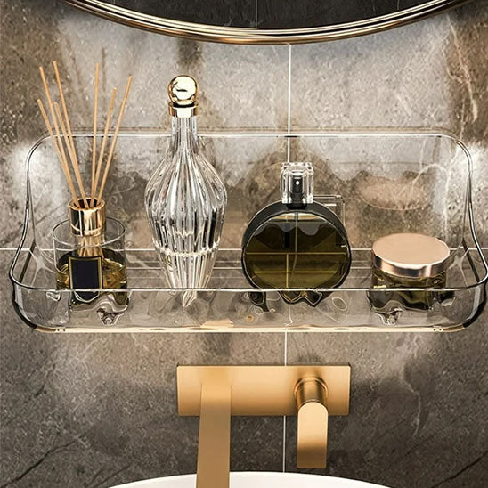 Étagère murale de salle de bain avec adhésif transparent, idéale pour ranger cosmétiques et accessoires beauté.