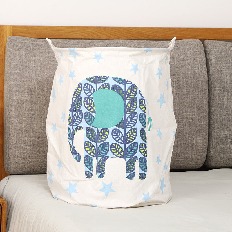 Panier à linge éléphant avec feuilles, parfait pour chambre d’enfant.