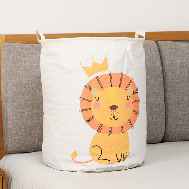 Panier à linge pliable motif lion couronné en coton et lin, idéal pour la chambre d’enfant.