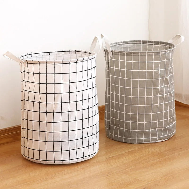 Panier à linge pliable gris pratique pour vêtements et linge.