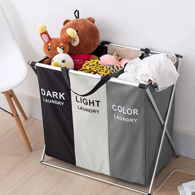 Panier à linge pliable compact pour un gain de place optimal dans la salle de bain.