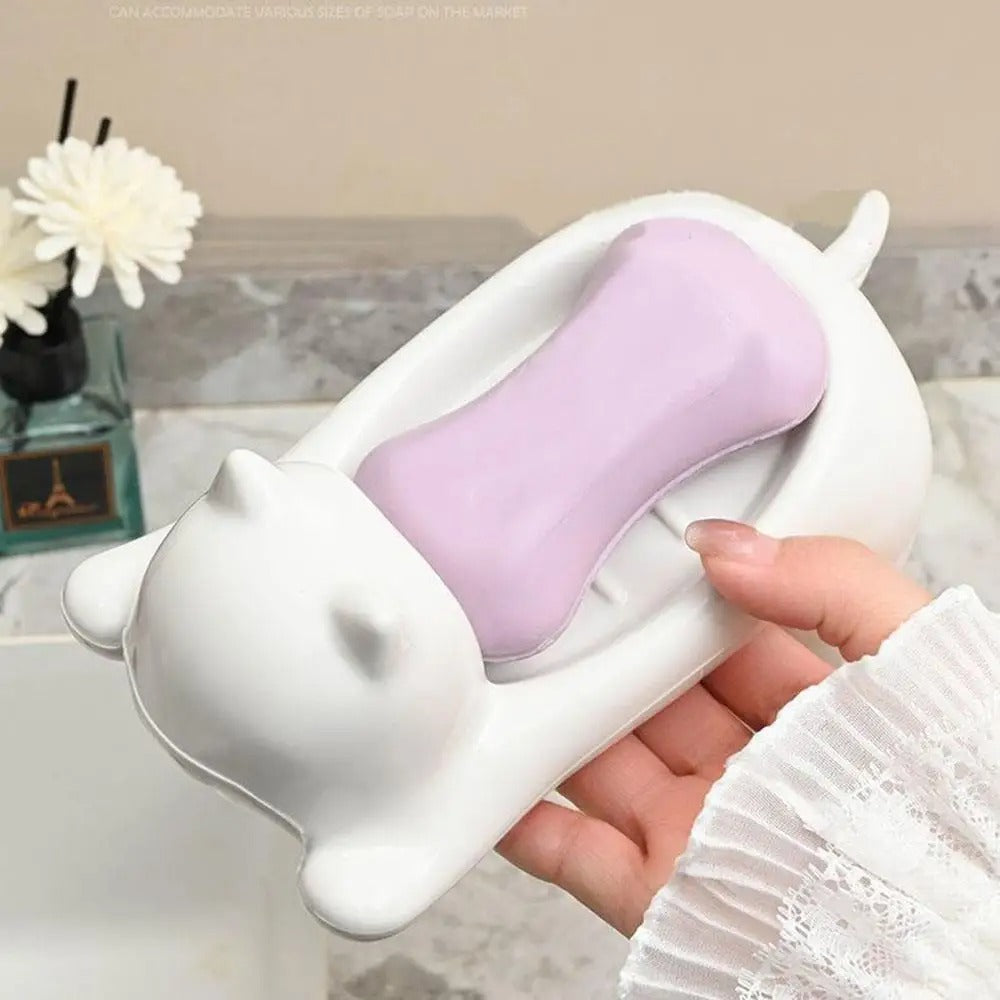 Porte-savon ludique adapté aux enfants, favorise l’autonomie dans la salle de bain.

