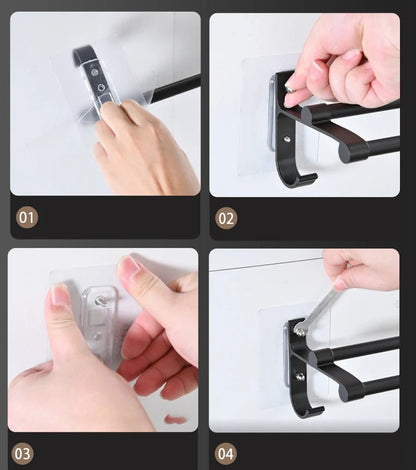 Porte-serviette mural double barre avec crochet intégré pour accessoires.